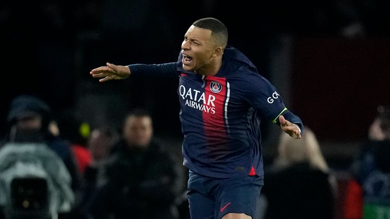 PSG&#39;s Kylian Mbappe celebrates after scoring his side&#39;s first goal from the penalty spot during the Champions League group F soccer match between Paris Saint-Germain and Newcastle United FC at the Parc des Princes in Paris, Tuesday, Nov. 28, 2023. (AP Photo/Christophe Ena)