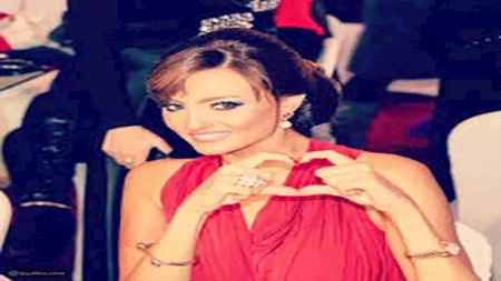 بشرى تتألق بإطلالة جذابة.. لماذا اختارت اللون الأحمر؟