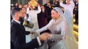 بالصور- لقطات رومانسية بين فريدة ابنة محمد هنيدي وزوجها من حفل زفافها