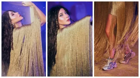 "كوتشي على فستان سوارية".. نانسي عجرم تستعرض إطلالتها بكواليس كليبها الجديد