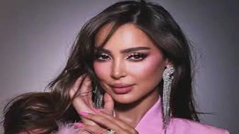 حجاب وفستان أنيق.. بسمة بوسيل بلوك جذاب حجاب وفستان أنيق.. بسمة بوسيل بلوك جذاب