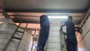 صور.. إنقاذ عاملين سقطا داخل خزان مياه فارغ بالقاهرة