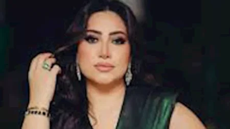 "سحر اللون الأخضر".. بوسي بلوك جذاب وأنيق