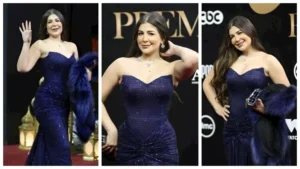 ملك قورة تخطف الأنظار بفستان أزرق أنيق في حفل المتحدة (صور)