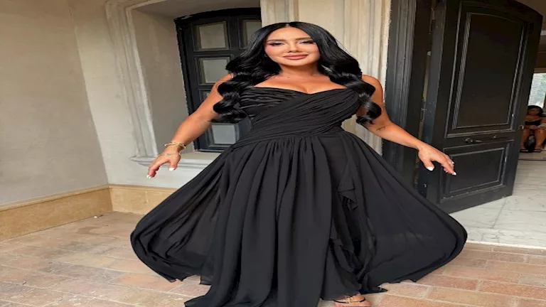 مي القاضي تتألق بفستان أسود.. كيف نسقت إطلالتها؟ 1 مي القاضي